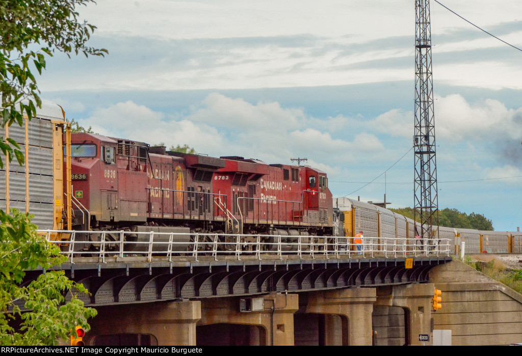 CP AC44CW + ES44AC Locomotives leading a train